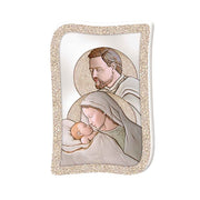 Bomboniera verticale con Sacra Famiglia astratta in forme sovrapposte dai colori blu, grigio e oro, su sfondo dinamico a onde geometriche.