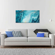 Quadro con effetto onde astratte e tonalità vibranti, per un tocco unico. Posizionato sopra il divano, aggiunge un tocco sofisticato.