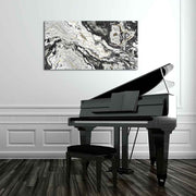 Quadro decorativo con linee fluide e contrasti cromatici, per un tocco moderno. Posizionato in soggiorno, dona eleganza e armonia all’ambiente.