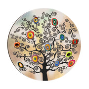 Magnete in legno con albero nero dai rami a spirale e fiori astratti colorati su sfondo sfumato beige-verde.