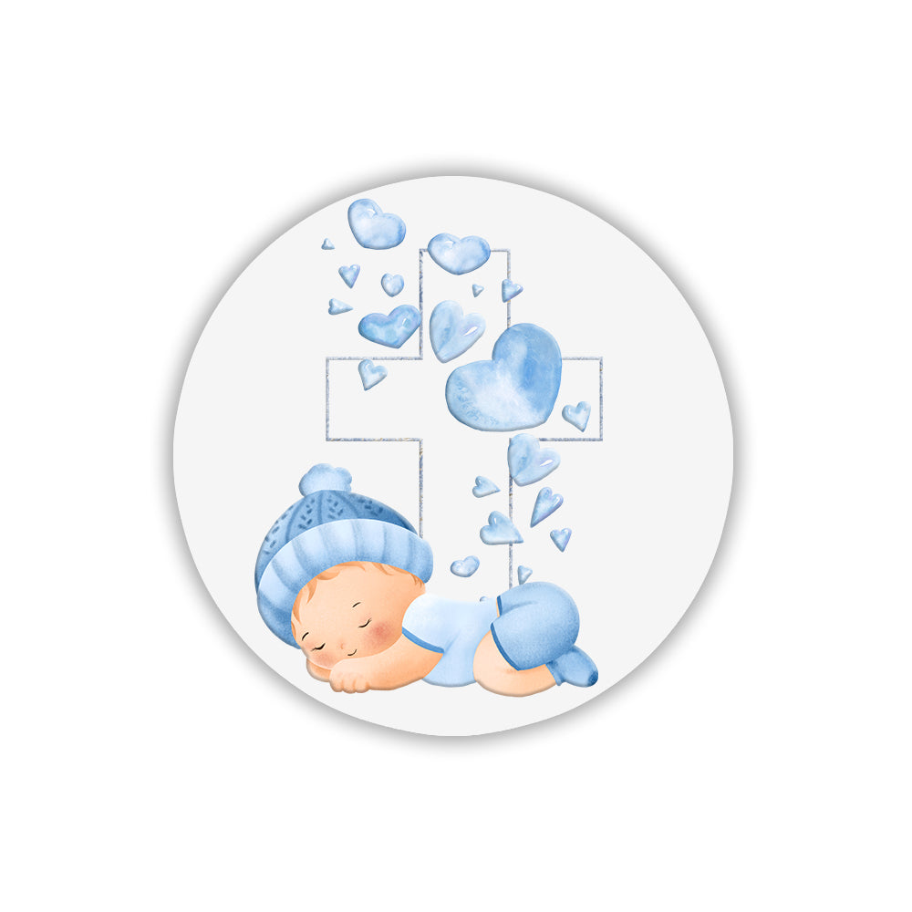 Calamita tonda in legno con neonato con cappellino azzurro, croce e pioggia di cuori celesti sfumati. Decorazione per nascita o battesimo bimbo.