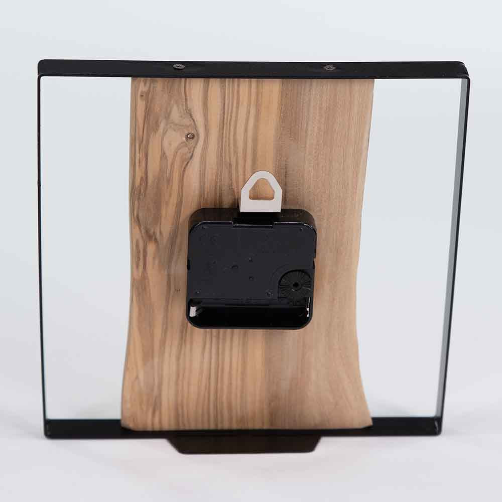 Retro dell'orologio ulivo acciaio da tavolo, con focus sul supporto e la struttura in metallo.