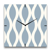 orologio da parete quadrato con forme moderne color azzurro polvere