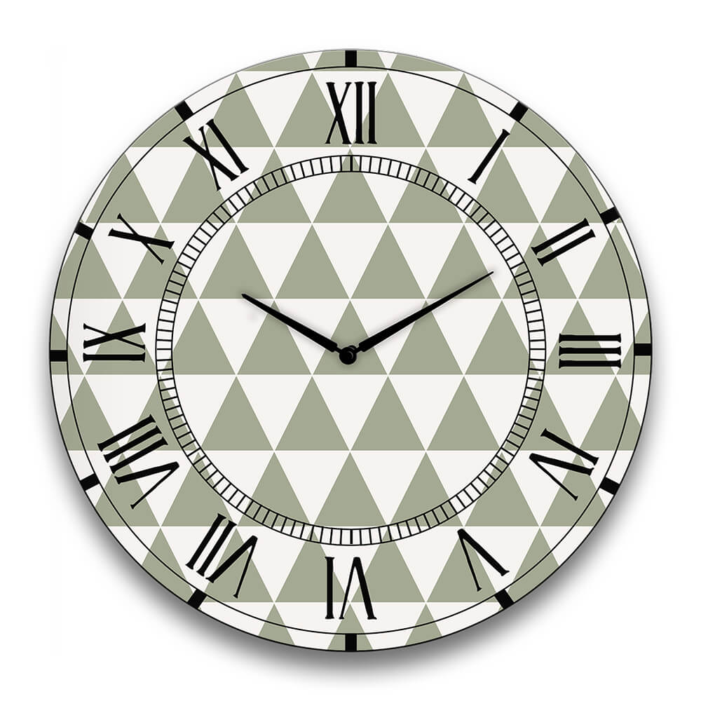 orologio da parete rotondo con forme geometriche verde salvia