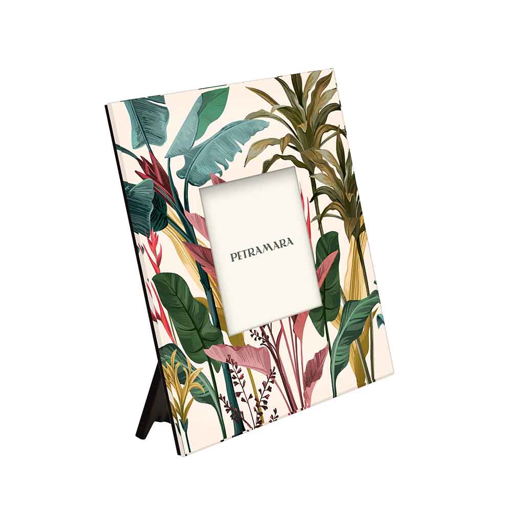 Vista laterale di portafoto vetro quadrato con stampa di foglie di banano verdi, dettaglio tropicale raffinato.