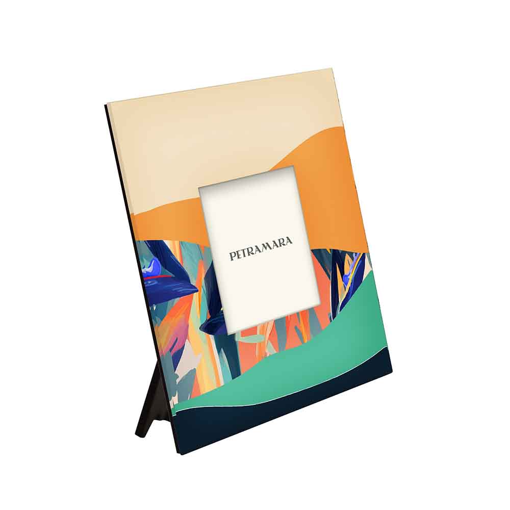 Vista laterale di portafoto vetro quadrato con fiori di sterlizia, evidenziando il dettaglio della stampa.