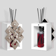 Profumatore bomboniera in legno con simbolo zen stilizzato intagliato, evocando armonia e equilibrio interiore.