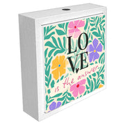 Profumatore ceramica bianco con scritta decorativa realizzata con linee eleganti e dettagli raffinati. Vista laterale che valorizza il design.