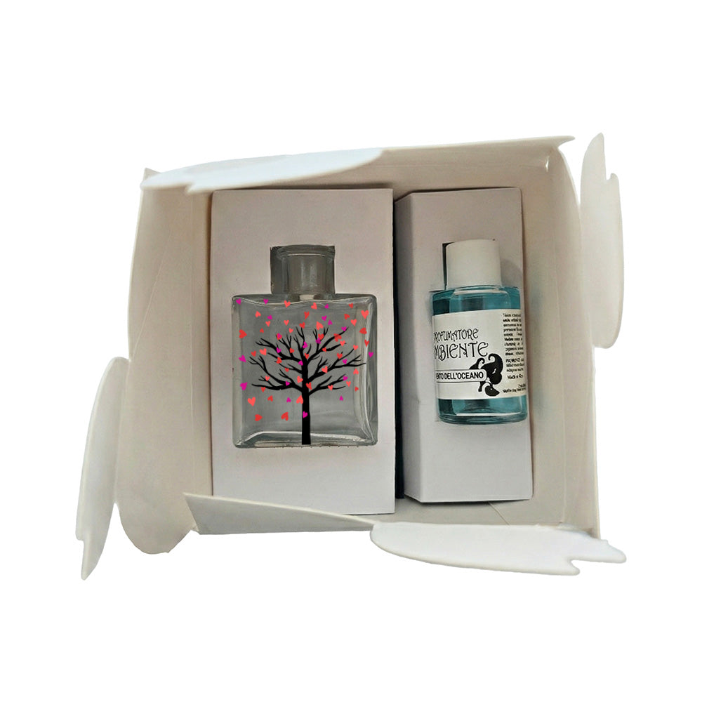Kit profumatore vetro in scatola bianca, flacone con albero dai rami neri e pioggia di cuori colorati in rosa rosso e viola, fragranza Vento dell'Oceano inclusa