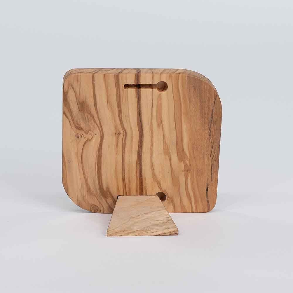 Retro di un quadretto in legno d'ulivo piccolo, con superficie liscia e foro per appenderlo facilmente.