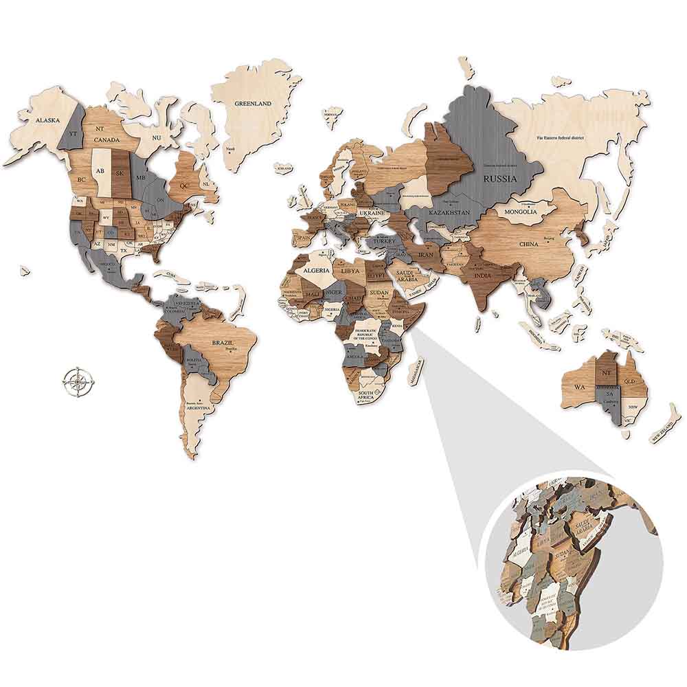 Dettaglio ravvicinato di un planisfero in legno, mettendo in risalto la tridimensionalità tra i continenti.
