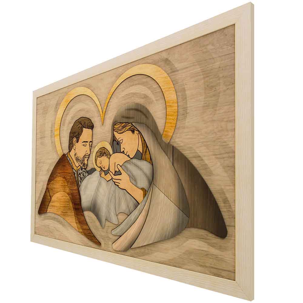 Vista laterale di un quadro in legno a rilievo con Sacra Famiglia incorniciata, per esaltare la tridimensionalità del decoro.
