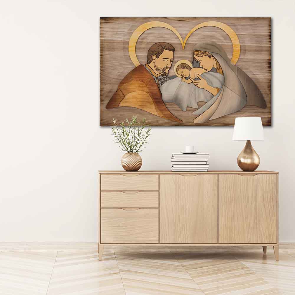 Quadro su pannello in legno, su di esso è riprodotta la Sacra Famiglia in rilievo, posizionato su una parete del soggiorno.