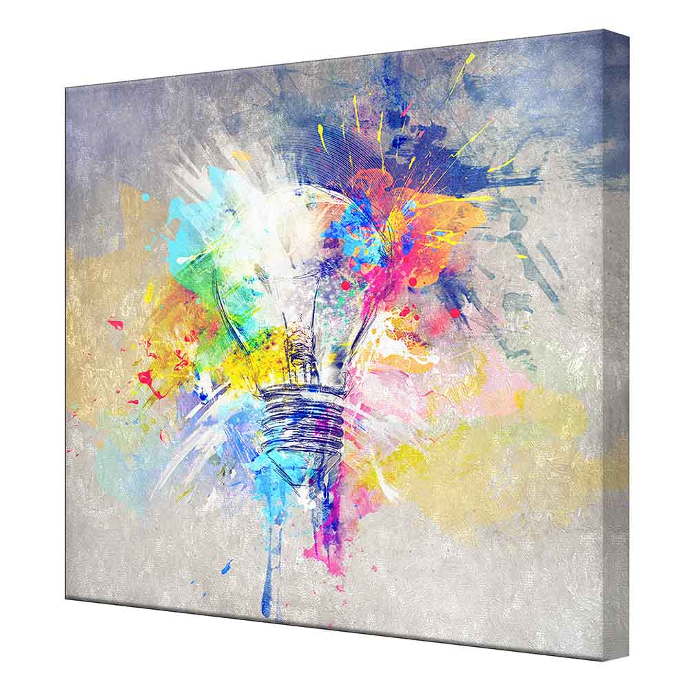 Quadro su tela con con lampadina ed esplosione di colori, visto lateralmente, con tonalità dinamiche e luminose.