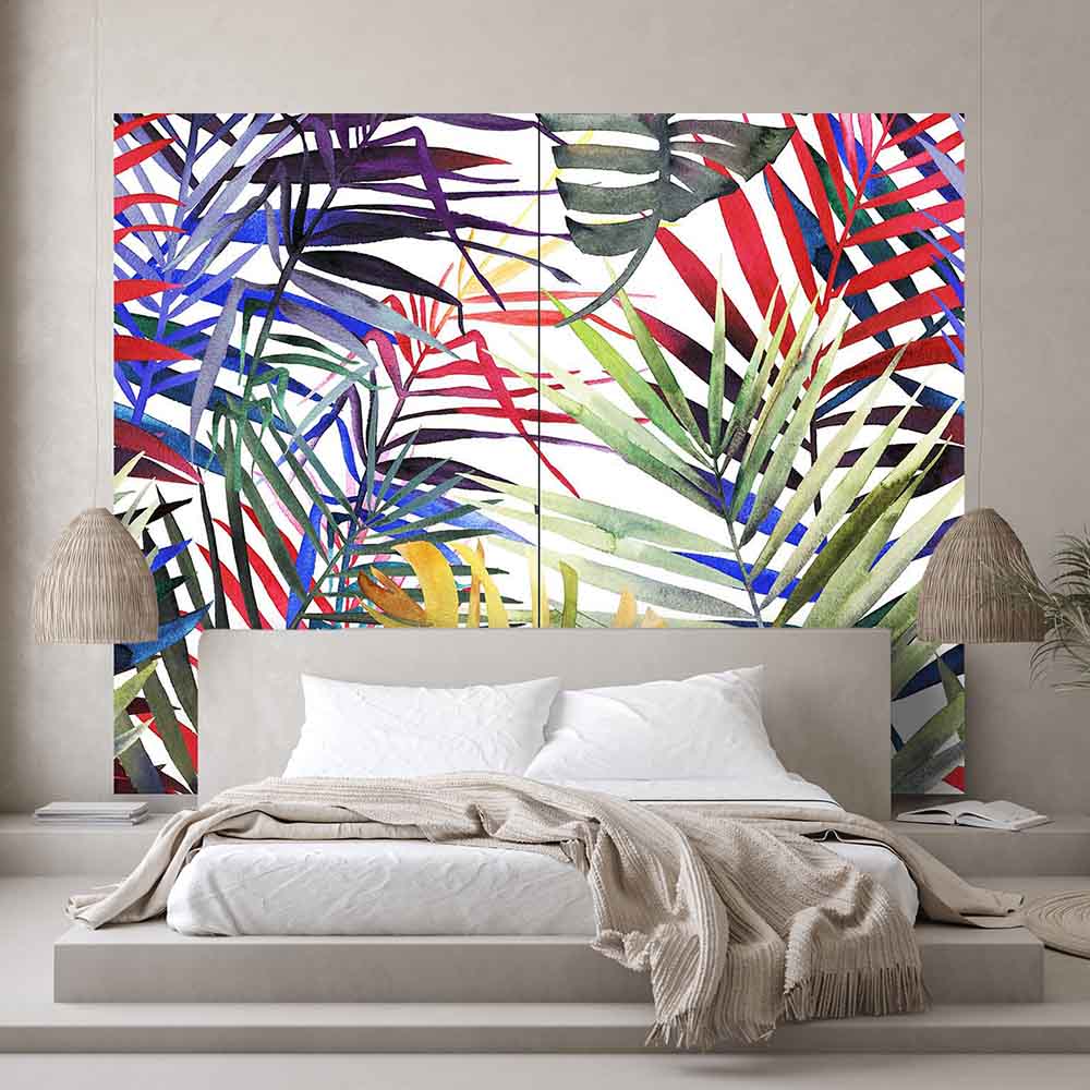 Quadro su tela grande con foglie tropicali dai colori accesi, rosso, blu e verde, perfetto per camere da letto dal gusto esotico e vivace.