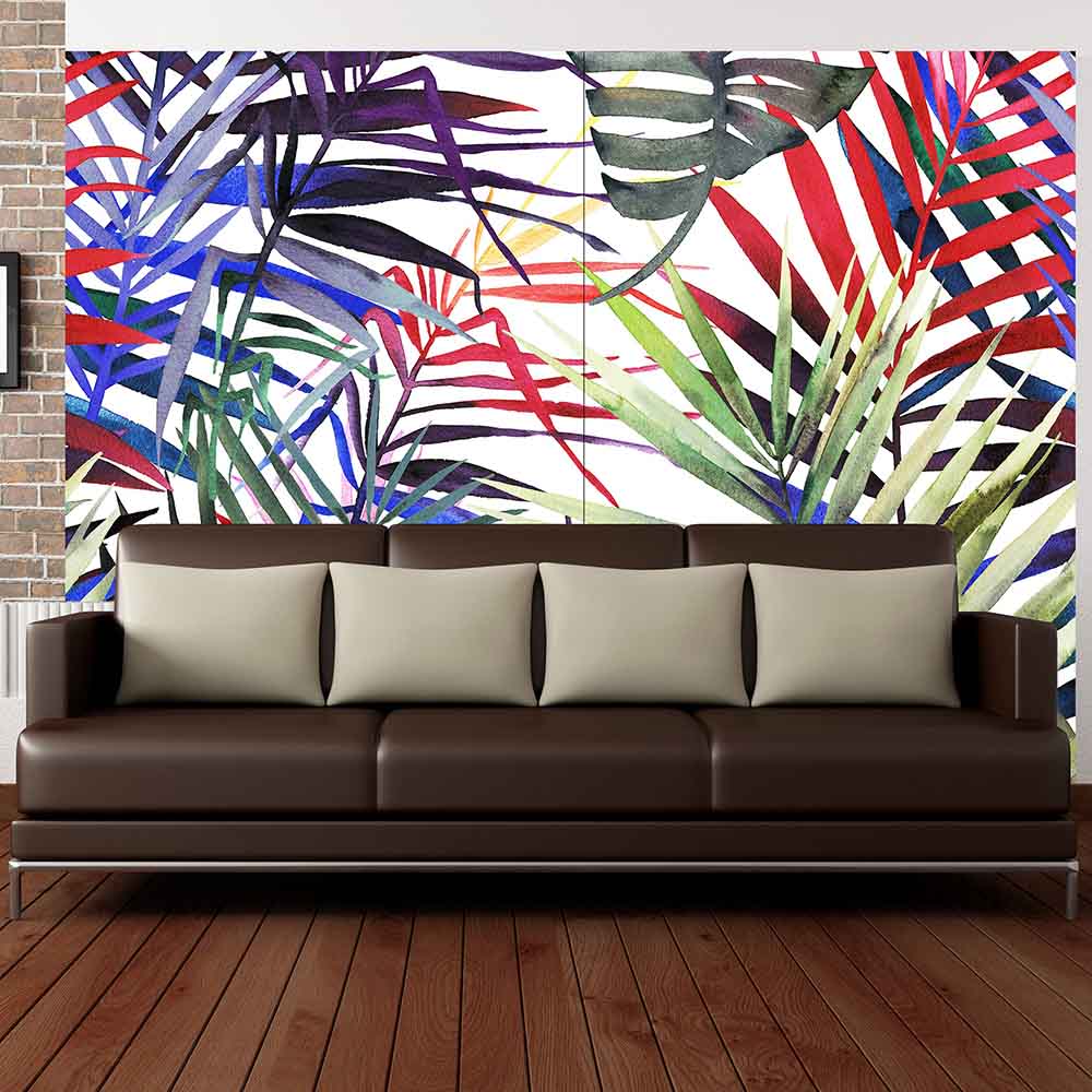 Quadro su tela grande con foglie dai colori accesi e sfumature artistiche, posizionato sopra un divano elegante.