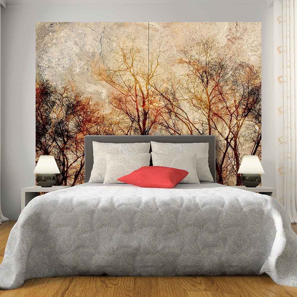 Quadro su tela grande con foliage autunnale nei toni caldi, collocato in una camera accogliente.