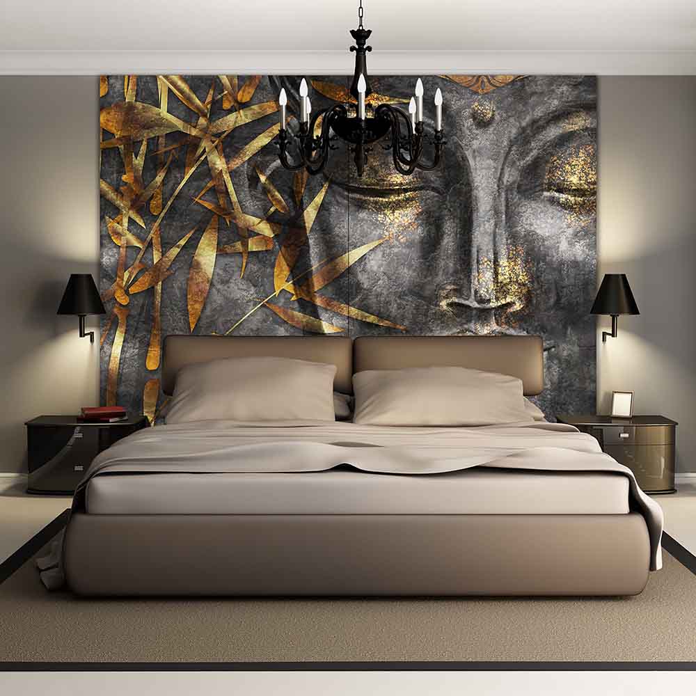 Quadro su tela grande con volto dorato del Buddha tra foglie bamboo su sfondo scuro, perfetto per camere da letto in stile zen e rilassante.