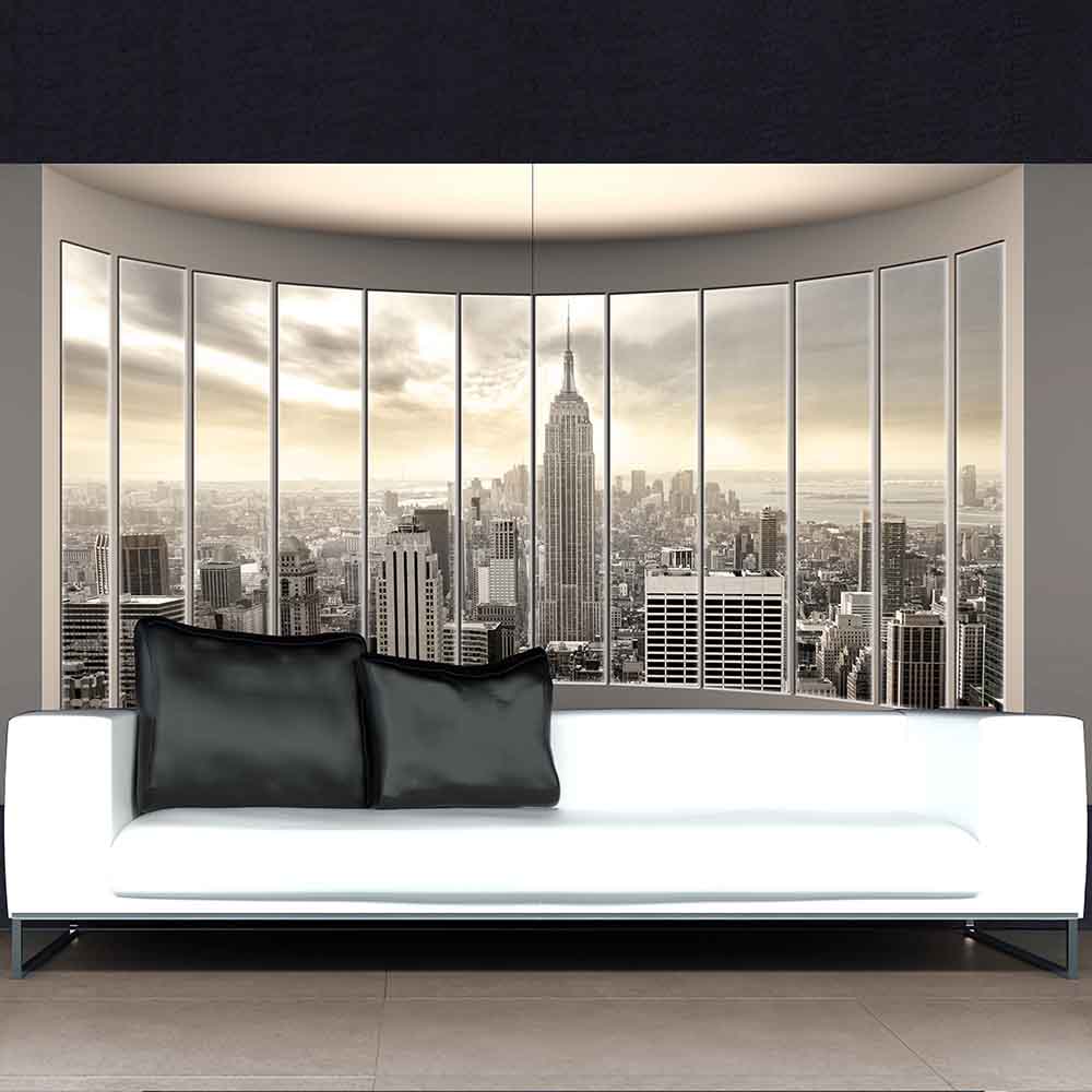 Quadro su tela grande con veduta urbana dei grattacieli di New York, posizionato sopra un divano moderno.