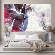 Quadro su tela grande con onde di fumo colorato in movimento, decorando una camera con un tocco mistico.