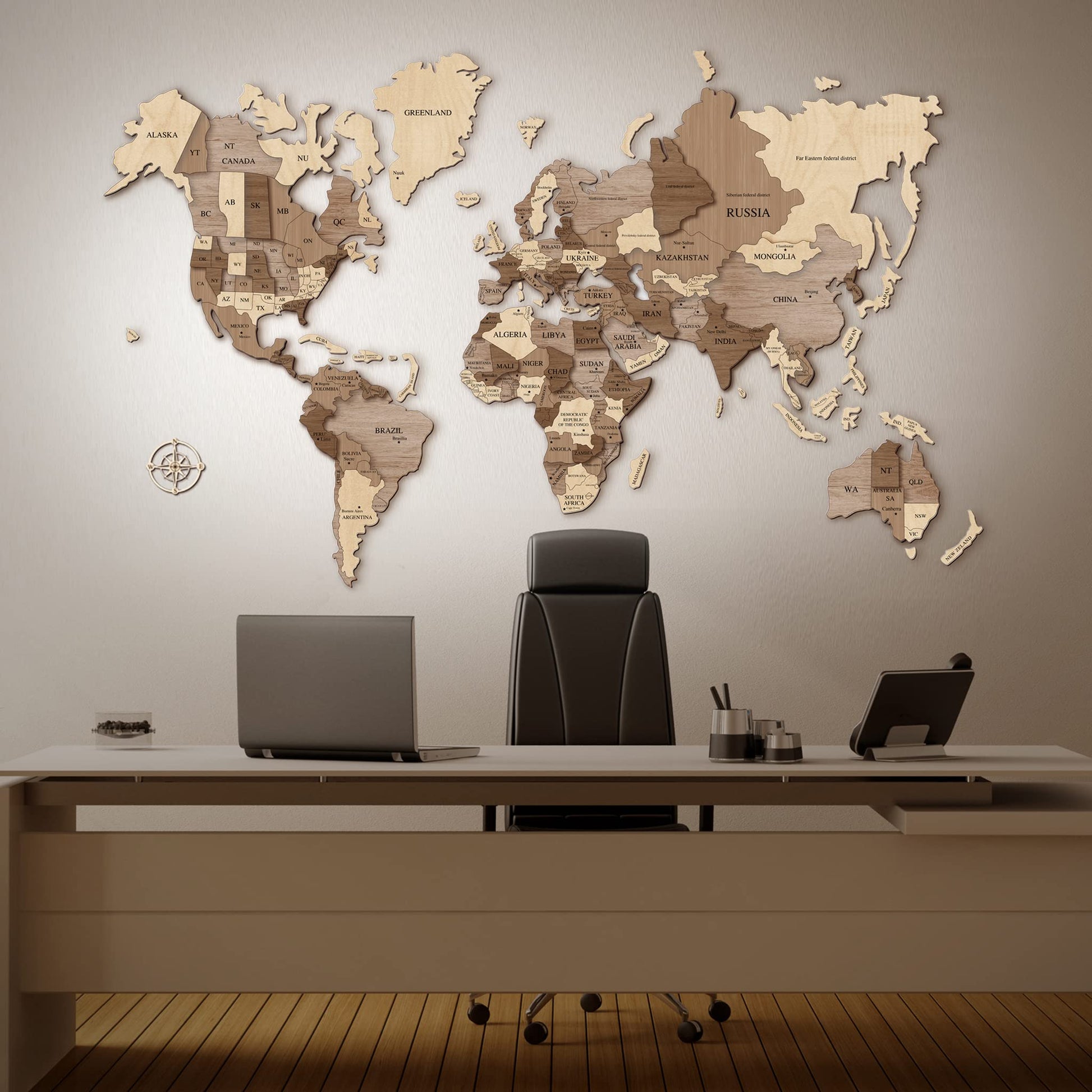 Planisfero in legno a rilievo composto da pezzi singoli di diverse misure che raffigurano i continenti e i loro paesi. Applicato al muro di un ufficio senza pannello posteriore.