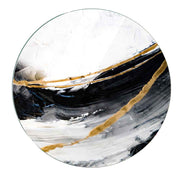 Sottopentola in vetro con motivo a onde nere su sfondo chiaro, dallo stile elegante e contemporaneo.