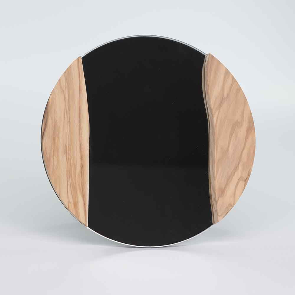 Specchio rotondo con cornice in ulivo, dal design elegante e minimalista, perfetto per ambienti moderni e raffinati.